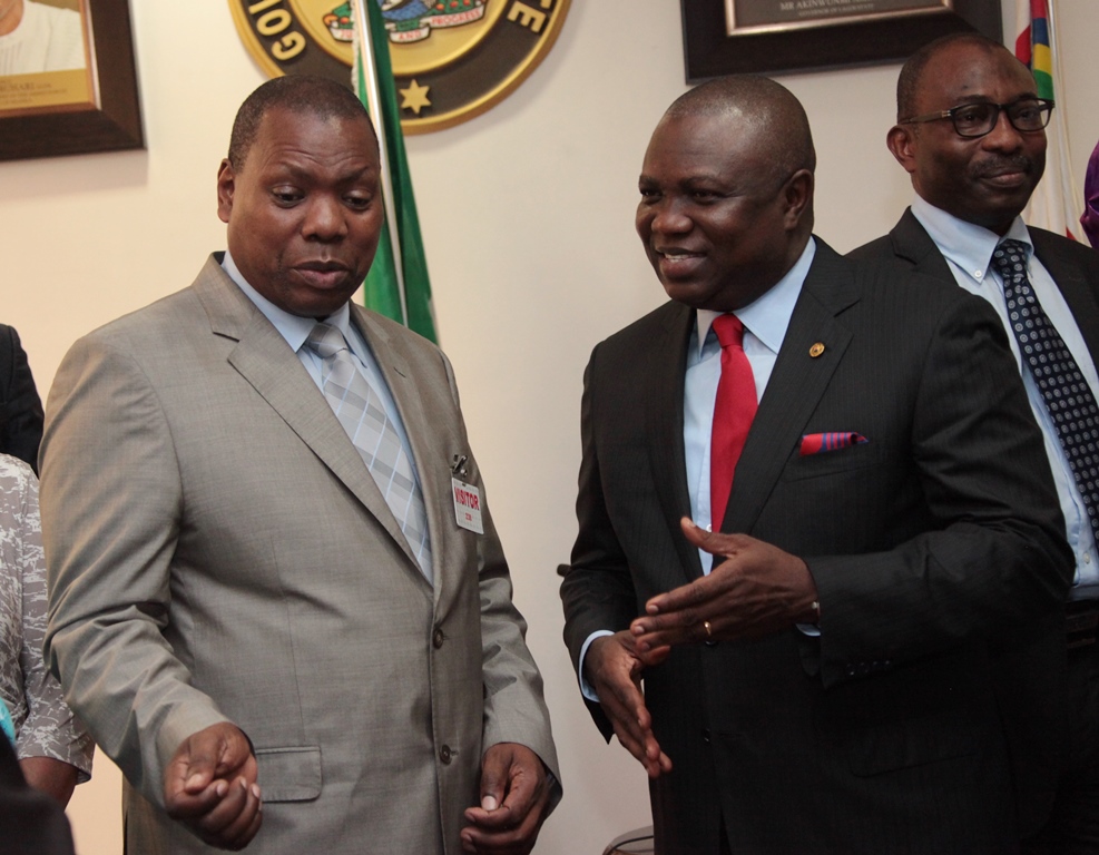 Lagos State Governor, Mr. Akinwunmi Ambode (right) discussing with the Treasurer General, South Africa’s African National Congress  (ANC), Dr. Zwelini Mkhize (left) during a courtesy visit to the Governor at the Lagos House, Ikeja, on Friday, July 24, 2015.width=