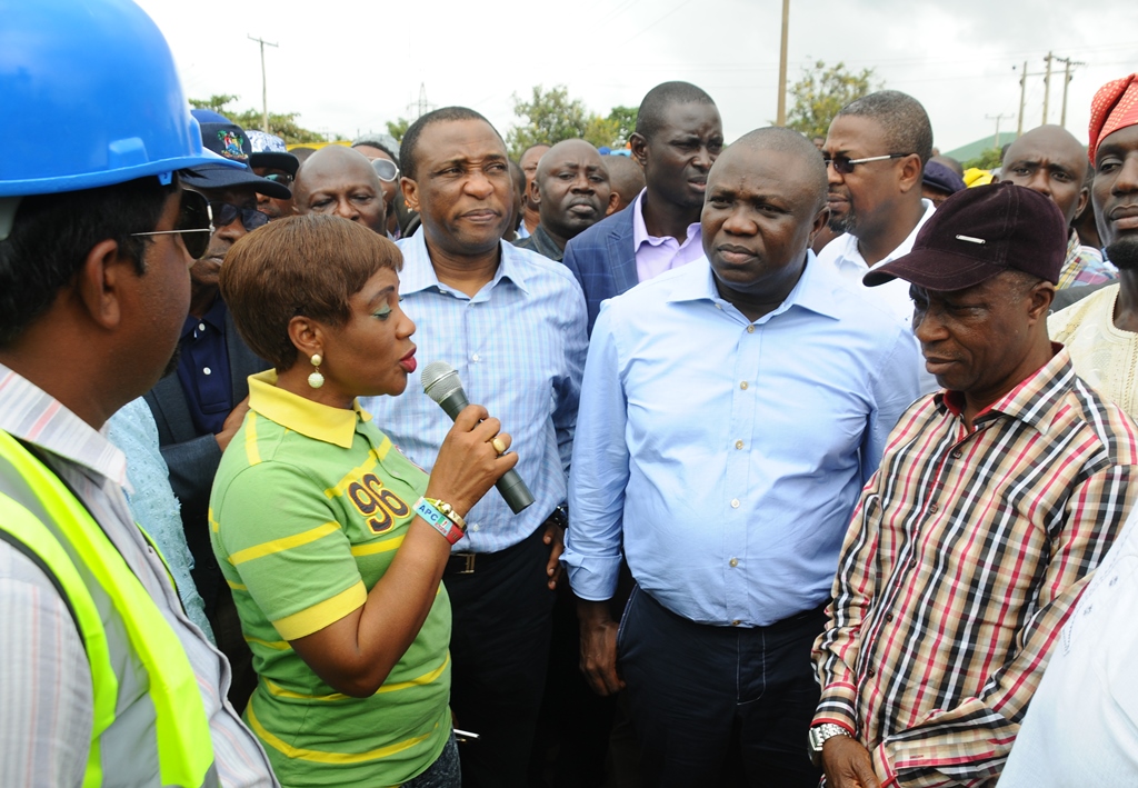 Lagos State Governor, Mr. Akinwunmi Ambode (2nd right), the Secretary to the State Government, Mr Tunji Bello (middle), member, Lagos State House of Assembly, Alimosho Constituency, Hon. Bisi Yusuf (right) listen with rapt attention tothe Executive Secretary, Mosan-Okunola Local Council Development Area, Hon Adunni Akindele (2nd left) during the Governor’s inspection of Ipaja road, Estate Gate Bus stop, Ipaja, on Wednesday, August 19, 2015.