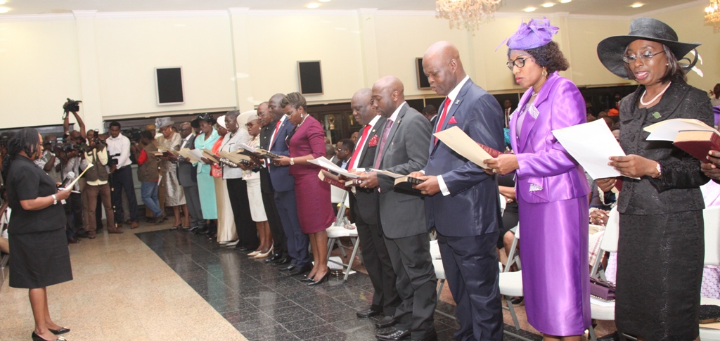 A cross section of the newly appointed 19 Permanent Secretaries taking their Oath of Office before the Director, Legislative Drafting, Ministry of Justice, Mrs. Tola Akinsanya (left) presided by Governor Ambode at the Banquet Hall, Lagos House, Ikeja, on Wednesday, August 05, 2015.
