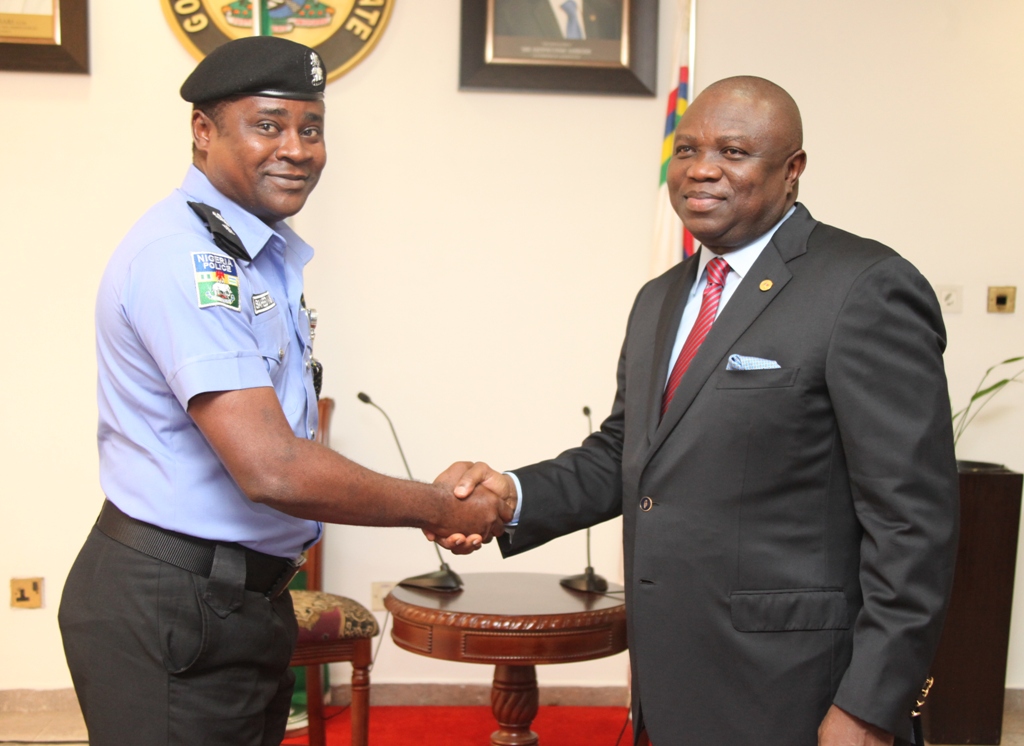 Lagos State Governor, Mr. Akinwunmi Ambode (right) congratulating his Chief Security Officer (CSO), Mr. Saheed Kassim (left) after being decorated as a Chief Superintendent of Police (CSP) at the Lagos House, Ikeja, on Tuesday, August 11, 2015.