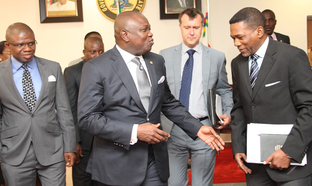 Lagos State Governor, Mr. Akinwunmi Ambode (2nd left) discussing with the South West Regional Coordinator, DFID, Head of Lagos Office, Mr. Sina Fagbenro-Byron (right) during a courtesy visit to the Governor by DFID , at the Lagos House, Ikeja, on Tuesday, August 18, 2015. With them are the Head, Department For International Development (DFID) Nigeria, Mr. Ben Mellor (2nd right) and State Programme Manager, DFID-SPARC, Mr. Ifeanyi Peters Ugwuoke (left).