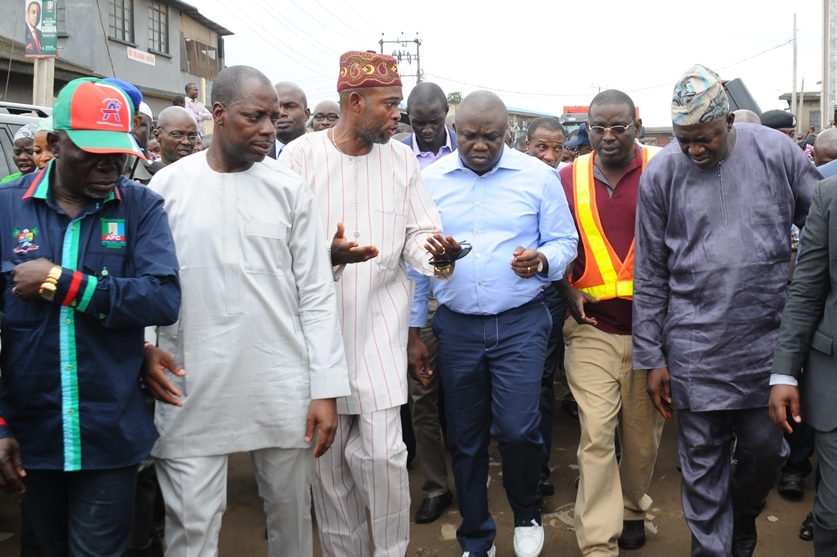 Lagos State Governor, Mr. AkinwunmiAmbode (3rd right), the Executive Secretary, Bariga Local Council Development Area, Hon. AladeKolade (3rd left), his Somolu Local Government counterpart, Hon. AbiodunOrekoya (2nd left), Chief Whip, Lagos State House of Assembly, Hon. RotimiAbiru (right), Site Engr., HFP, Engr. ShowoleOlatunde (2nd right) during the Governor’s inspection of on-going construction of Pedro road, Ladi-lak, Bariga, on Wednesday, August 19, 2015.