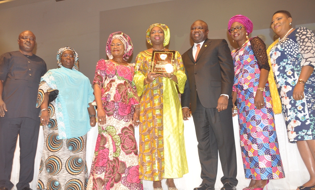 Lagos State House of Assembly Speaker, Rt. Hon. Mudashiru Obasa, Lagos State Deputy Governor, Dr. (Mrs.) Oluranti Adebule and the Speaker, Osun State Deputy Governor, Mrs. Titi-Laoye Tomori, Award Recipient of Certificate of Appreciation to Friends of COWLSO, Hon. Abike Dabiri- Erewa, Lagos State Governor, Mr. Akinwunmi Ambode, Chairman, Committee of Wives of Lagos State Officials (COWLSO), Mrs. Bolanle Ambode and Women Leader, South West All Progressives Congress, Chief (Mrs.) Kemi Nelson during the closing ceremony of the National Women Conference 2015 with the theme: Relevance in Economic Turbulence, organized by COWLSO, at the Convention Centre, Eko Hotels & Suite on Friday, September 18, 2015.