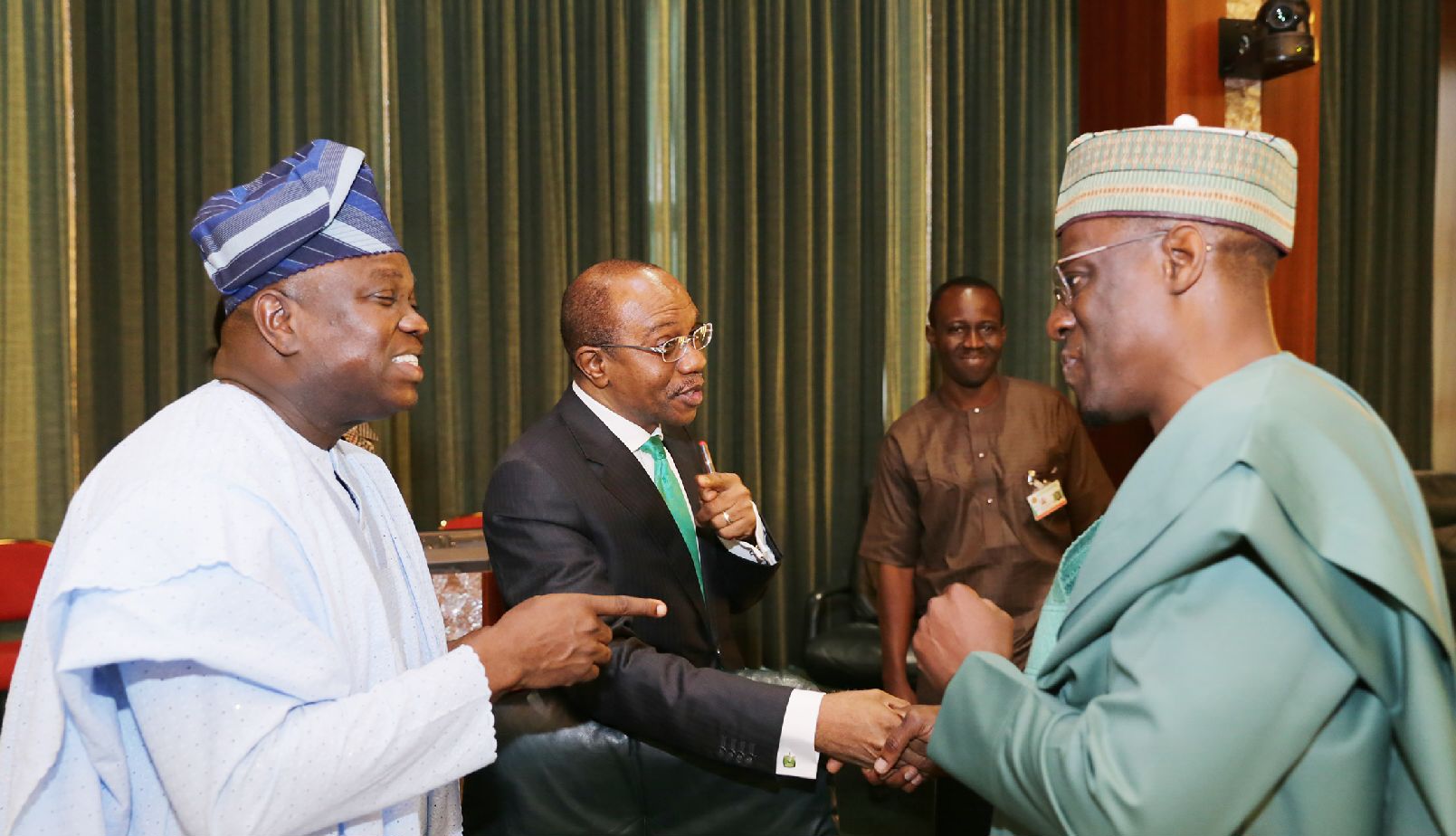 L-R: Lagos State Governor, Mr. Akinwunmi Ambode, Governor, Central Bank of Nigeria, Mr. Godwin Emefiele  and Governor of Kwara State, Alhaji Abdulfatah Ahmed during the NEC meeting at the State House, Abuja on Thursday, September 17, 2015.