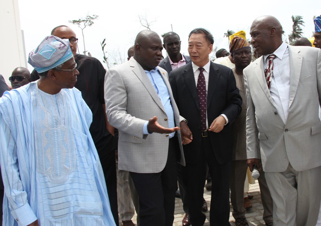 Lagos State Governor, Mr. Akinwunmi Ambode (2nd left) discussing with the Managing Director, Lekki Free Zone Development Company, Mr. Ding Yonghua (2nd right), Managing Director, Lekki Worldwide Investments Limited, Mr. Tajudeen Disu (right)and the Chairman, Lekki Free Zone Development Company,  Otunba Olusegun Jawando (2nd left) during the Governor’s inspection visit to the Lekki Free Zone, Imobido, Ibeju-Lekki, Lagos, on Wednesday, September 9, 2015.