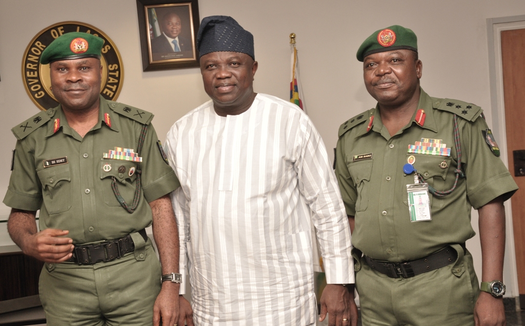 Lagos State Governor, Mr. Akinwunmi Ambode (middle), flanked by the General Officer Commanding 81 Division, Nigerian Army, Major General Henry Edet (left) and the Commander 9 Mechanized Brigade, Brigadier General Ahmed Mohammed Sabo (right) during a courtesy call on the Governor by the Major General, at the Lagos House, Ikeja on Tuesday, September 08, 2015.