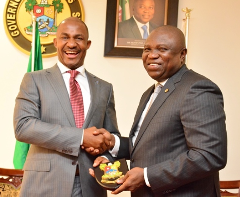 Lagos State Governor, Mr. Akinwunmi Ambode (right) presenting a state plaque to the Executive Secretary, Nigeria Christian Pilgrims Commission, Mr. John Kennedy Opara during his courtesy visit to the Governor, at the Lagos House, Ikeja, recently. 