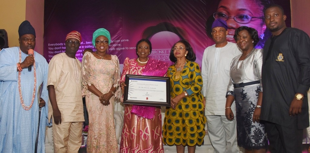 -L: Director, Governance, Leadership, Economic, Environmental & Human Development (GLEEHD), Mr. Dayo Isreal, Lagos State Head of Service, Mrs. Olabowale Ademola; Secretary to the State Government, Mr. Tunji Bello; the Yeye Oge of Lagos, Chief (Mrs.) Opral Benson; Celebrant, Dr. Ibironke Sodeinde; Wife of Lagos State Governor, Mrs. Bolanle Ambode; Special Adviser to the Governor, Public Works Corporation, Engr. Ayotunde Sodeinde and Head of Idejo Family, Chief Fatia Olumegbon during a special recognition of meritorious service in the Lagos State Civil Service for Dr. Sodeinde, at the Adeyemi Bero Auditorium, Alausa, Ikeja, on Tuesday, June 7, 2016.