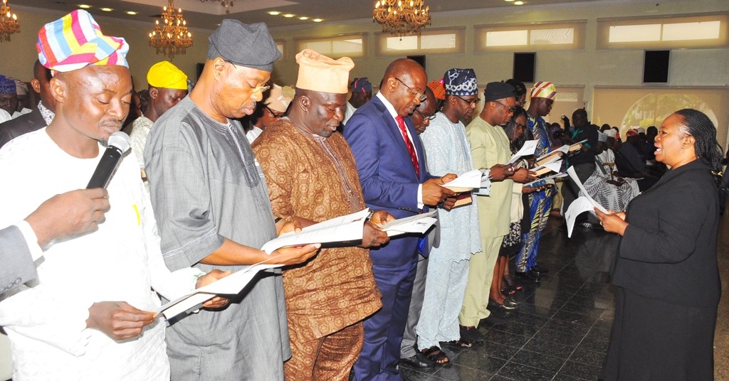 Cross section of the newly appointed Sole Administrators for 20 Local Governments and 37 Local Council Development Areas in the State taking Oath of Office before Governor Akinwunmi Ambode during the swearing-in, at the Banquet Hall, Lagos House, Ikeja on Monday, June 13, 2016.
