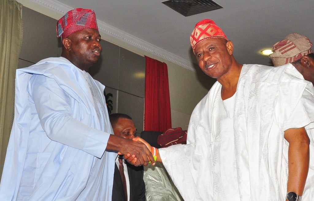 Lagos State Governor, Mr. Akinwunmi Ambode (left), congratulating Mr. Adeleke Ipaye (right), after being sworn in as Sole Administrator of Ojokoro LCDA during the swearing-in of Sole Administrators of the 20 Local Governments and 37 Local Council Development Areas in the State, at the Banquet Hall, Lagos House, Ikeja on Monday, June 13, 2016.