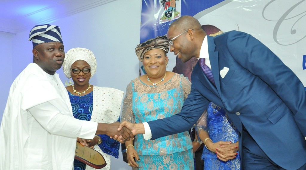 L-R: Lagos State Governor, Mr. Akinwunmi Ambode; his Wife, Bolanle; member, Committee Encouraging Corporate Philanthropy (CECP-Nigeria), Chief (Mrs.) Kemi Nelson andPresident, Nigerian Stock Exchange (NSE), Mr. Aigboje Aig-Imoukhuede during a Special #GivingTuesday organized by the CECP-Nigeria to mark the Governor’s 53rd birthday, at the Banquet Hall, Lagos House, Ikeja, on Tuesday, June14, 2016.