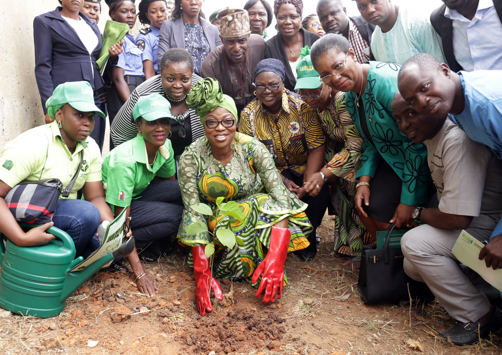 Wife of the Governor of Lagos State, Mrs Bolanle Ambode planting a Tree during the 2016 Tree Planting Exercise at Ikosi Snr. Secondary School, Ketu.