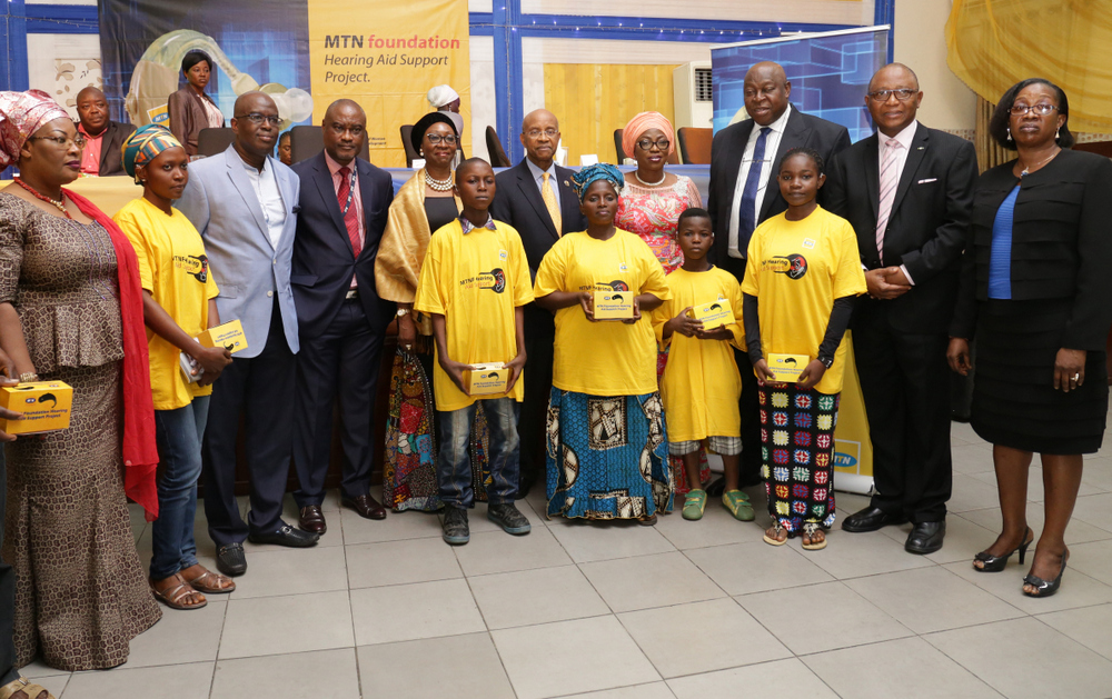 Wife of Lagos State Governor, Mrs Bolanle Ambode (2nd left); MTN Foundation Director, Mr. Dennis Okoro (left); MTN Executive, Mrs. Amina Oyagbola (2nd right); and rep. of governor of Lagos State, Dr. Olufemi Onanuga (right), during the Hearing Aid Support Project Distribution ceremony at NECA House, Alausa, Ikeja, on Monday, 18 July, 2016.