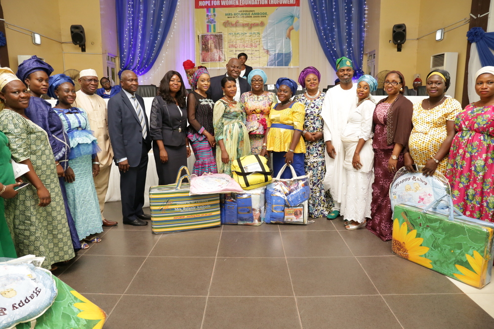 Wife of Lagos State Governor, Mrs. Bolanle Ambode (m); Representative of Hope For Women in Nigeria Initiative,(HOFOWEM), Ms Oyefunke O. Adeleke (6th left); Mrs. Olayinka Oladujoye (6th right); LAHA Chairman, House Committee of Health,Hon Segun Olulade (5th right); Commissioner for Youth and Social Development, Mrs. Uzamat Akinbile-Yussuf (3rd right); SA. Primary Healthcare, Dr. Olufemi Onanuga (8th left); Commissioner for Health, Dr Jide Idris (2nd right); Honourable Commissioner for LG., Hon. Muslim Folami (4th left); and beneficiaries, during the “Hope for Expectant Mothers” support programme, organized by HOFOWEM, at Alausa, on 20th July, 2016.