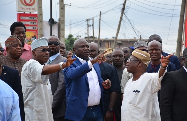 Lagos State Governor, Mr. Akinwunmi Ambode (middle), flanked by Commissioner for Works & Infrastructure, Engr. Ganiyu Johnson (right) and Permanent Secretary, Ministry of Works & Infrastructure, Engr. Ajibada Caster Bade-Adebowale (left) during the Governor’s inspection of the ongoing construction of multifaceted expansion projects at Berger Bus Stop, along Lagos-Ibadan Expressway, at the weekend