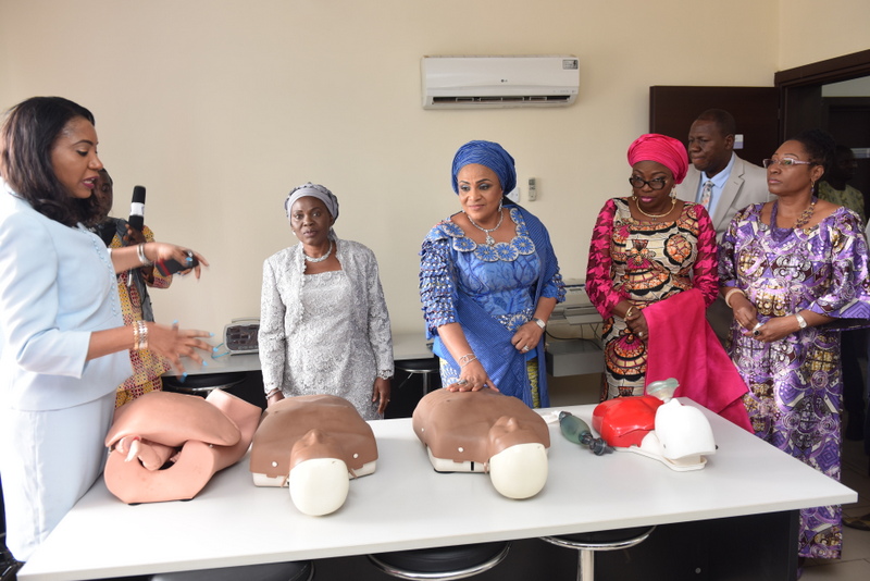 Coordinator, Access to Basic Medical Care Foundation, Mrs. Dolapo Oyedipe (left) explaining some points to wife of the Governor of Lagos State, Mrs. Bolanle Ambode (2nd right); wife of the Governor of Oyo State & Founder of Access to Basic Medical Care Foundation, Mrs. Florence Ajimobi (m); wife of Oyo State Deputy Governor, Chief (Mrs.) Janet Adeyemo (2nd left); and wife of the Minister of Solid Minerals Development, Erelu Bisi Fayemi (left), during the 3rd annual Access to Basic Medical Care Foundation’s medical symposium with the theme: “The Role of HPV Testing in Cervical Cancer Screening in Nigeria”, at the Mauve 21 event centre, Ibadan, Oyo State