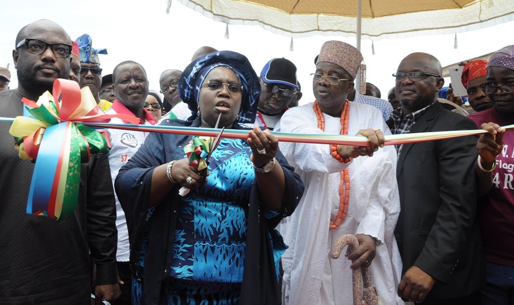 Lagos State Deputy Governor, Dr. (Mrs.) Oluranti Adebule (2nd left), cutting the tape to commission Jimoh Street in Ikorodu North LCDA, being supported by member, House of Representative, Ikorodu Federal Constituency, Hon. Babajimi Benson (left); Ayugburen of Ikorodu, Oba Kabiru Shotobi (middle); Majority Leader, Lagos State House of Assembly, Hon. Sanai Agunbiade (2nd right) and Sole Administrator, Ikorodu North LCDA, Shukura Okeowo during the Flag-Off of the Formal Commissioning of the 114 Roads across the Local Governments in the State, on Saturday, September 17, 2016.