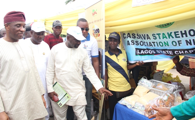 Representative of the Lagos State Governor and Secretary to the State Government (SSG), Mr. Tunji Bello; Commissioner for Agriculture, Hon. Toyin Suarau; Permanent Secretary, Ministry of Agriculture, Dr. Olayiwole Onsanya and Special Adviser on Food Security, Mr. Ganiu Okanlawon Sanni, admiring some farm produce made from cassava at the 2016 World Food Day grand finale held at the Johnson Agiri Agricultural Complex, Agege, on Sunday, October 16, 2016.