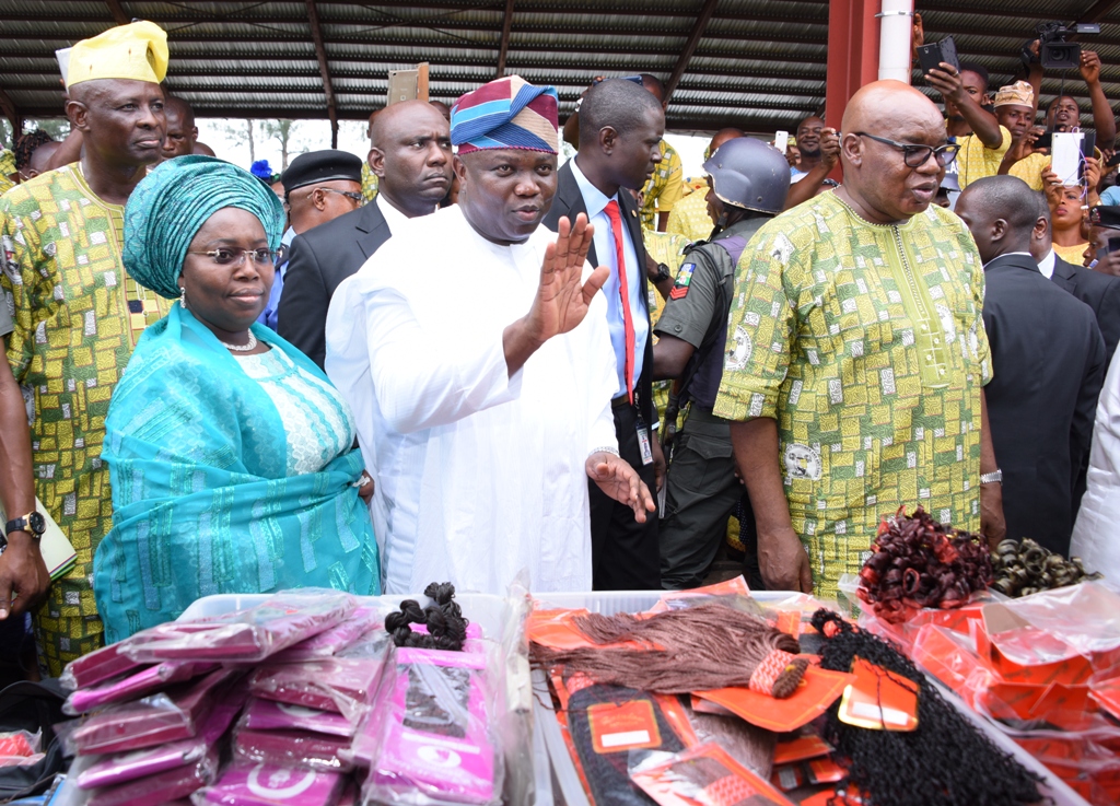 Lagos State Governor, Mr. Akinwunmi Ambode (middle), with Deputy Governor, Dr. (Mrs.) Oluranti Adebule (left); Commissioner for Wealth Creation & Employment, Dr. Babatunde Durosinmi-Etti (right) and President, Lagos State Council of Tradesmen & Artisan (LASCOTA), Alhaji Nurudeen Buhari (left behind), inspecting some wares at the Exhibition ground during the 7th Tradesmen and Artisans’ Week & Graduation Ceremony for Re-trained Artisans and Traders, at De Blue Roof, Agidingbi, Ikeja, on Tuesday, November 29, 2016. 