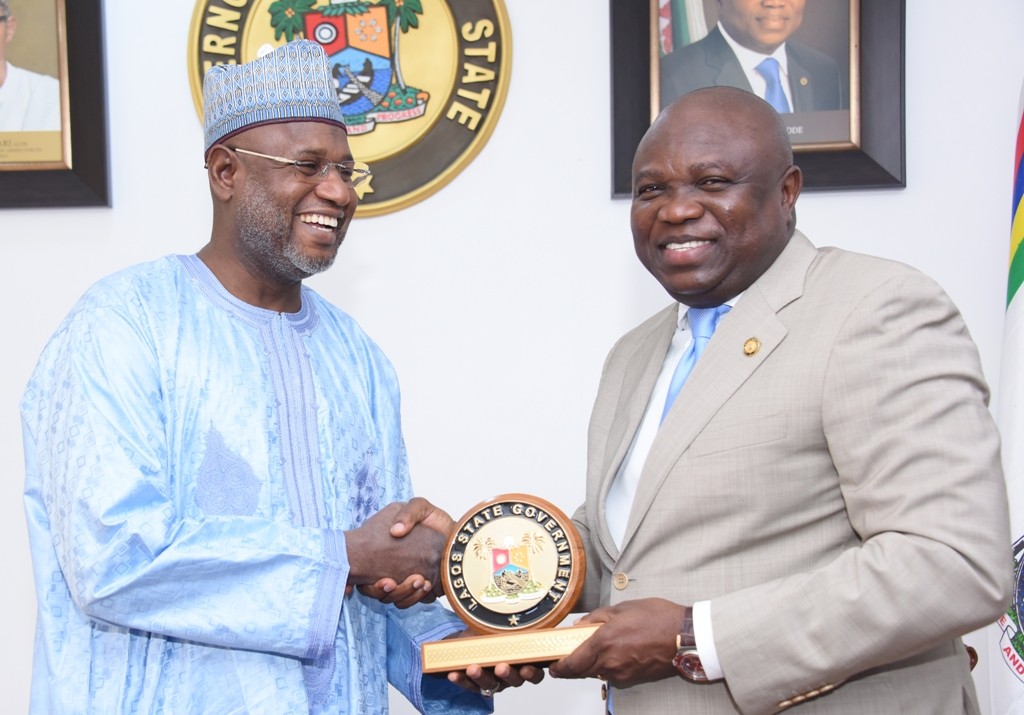 Lagos State Governor, Mr. Akinwunmi Ambode (right), presenting a State plaque to Chairman, Senate Committee on Marine Transport, Senator Sani Yerima during a courtesy visit to the Governor by the Committee, at the Lagos House, Ikeja, on Tuesday, November 1, 2016.