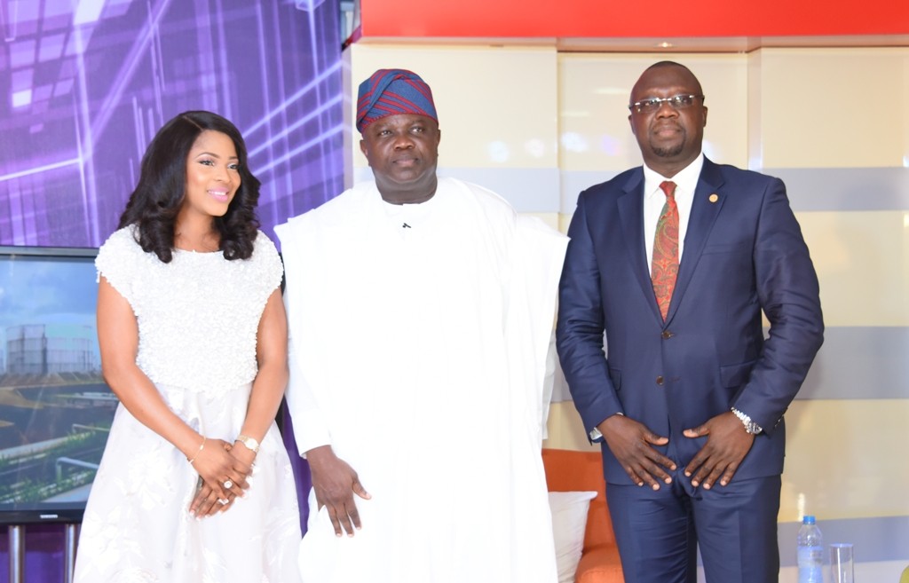 Lagos State Governor, Mr. Akinwunmi Ambode (middle), flanked by Special Adviser on Office of Overseas Affairs & Investment (Lagos Global), Prof. Ademola Abass (right) and Presenter, Temitope Oluseyi Oshin (left) during the Launching of the maiden edition of an Educative TV series: Lagos Global on TV at the Banquet Hall, Lagos House, Ikeja, on Thursday, November 3, 2016.