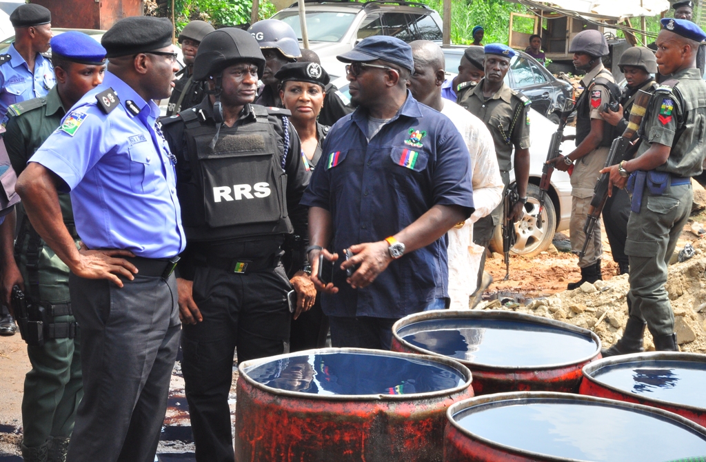 Lagos State Police Commissioner, Mr. Fatai Owoseni; with Commander, Rapid Response Squad (RRS), ACP Tunji Disu and Permanent Secretary, Lands Bureau, Lagos State Governor’s Office, Mr. Bode Agoro during the arrest of Operators of an illegal Oil Depot in Oregun, Onigbongbo LCDA, on Thursday, December 1, 2016