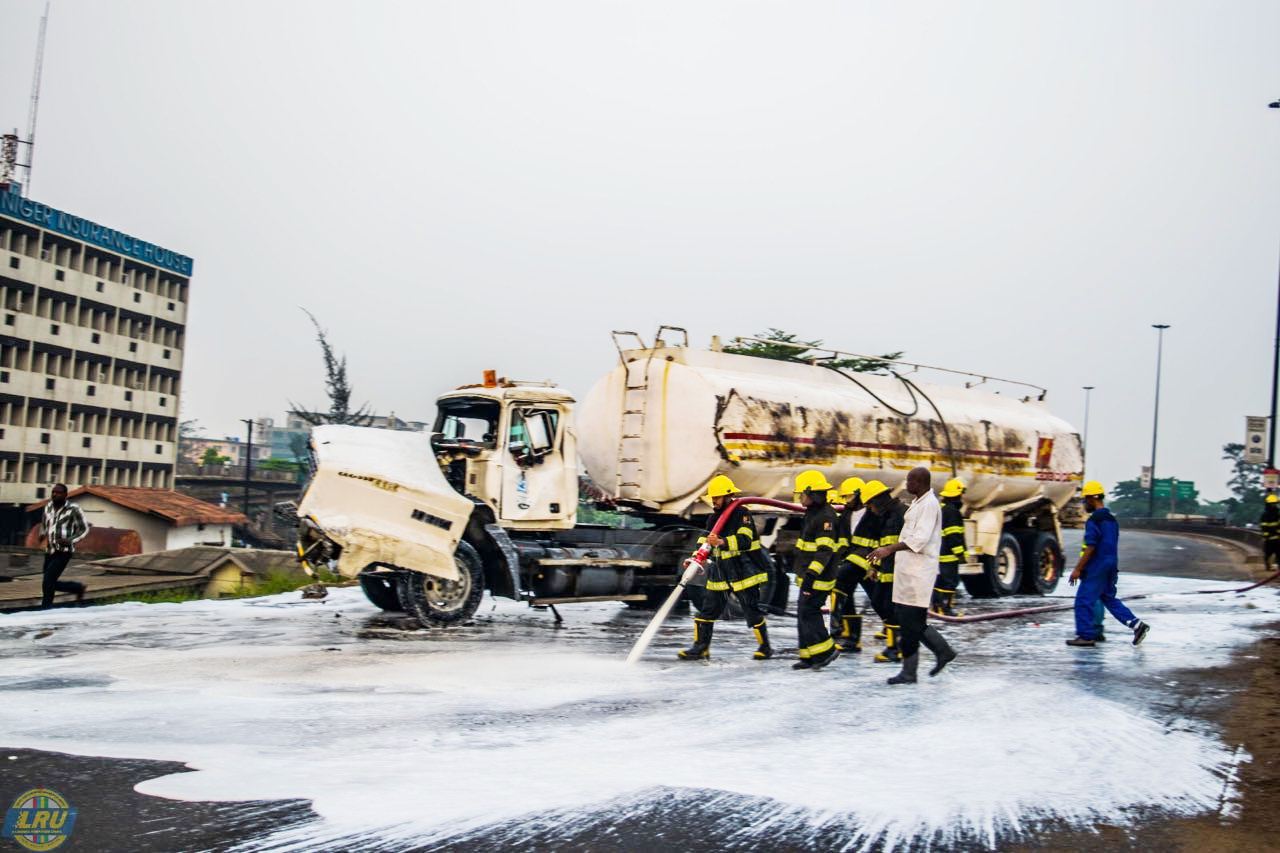 Men of the Lagos State Emergency Management Agency (LASEMA) and Fire Services in a rescue operation at the accident scene of a 33, 000 litres PMS laden tanker at the Anthony Bridge inward Gbagada, Lagos on Saturday, December 24, 2016.