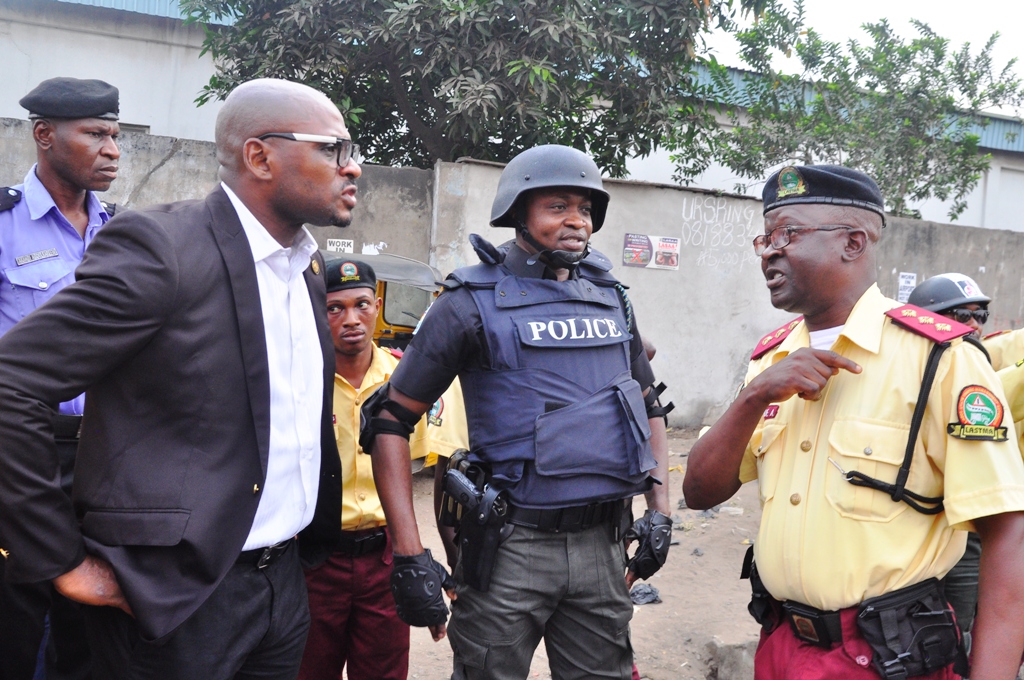 General Manager, Lagos State Traffic Management Authority, LASTMA, Mr. Olawale Musa; Chairman, Lagos State Task Force, SP Yinka Egbeyemi and LASTMA Traffic Officer, Mr. Akande Abiodun during a joint traffic enforcement at Agege and its environs on Friday, January 20, 2017.