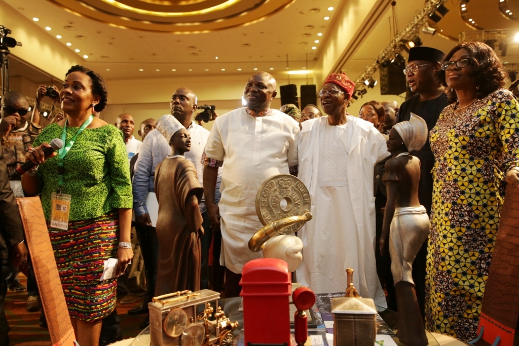 Lagos State Governor, Mr. Akinwunmi Ambode (2nd left); Minister of Information & Culture, Alhaji Lai Mohammed (3rd right); Founder/CEO, Omooba Yemisi Adedoyin Shyllon Art Foundation, Prince Yemisi Adedoyin Shyllon (2nd right); wife of Lagos State Governor, Bolanle (right), being conducted round some of the artworks by Curator, Mrs. Simidele Adesanya during the Opening of the Rasheed Gbadamosi Art Exhibition as part of activities to celebrate Lagos@50 at the Eko Hotel & Suites, Victoria Island, Lagos, on Friday, January 27, 2017.