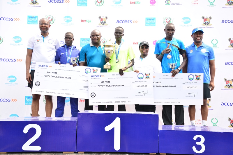 Lagos State Governor, Mr. Akinwunmi Ambode (3rd left), with President, Nigeria Stock Exchange, Mr. Aigboje Aig-Imoukhuede; 2nd Prize Winner of the 2017 Lagos City Marathon, Ronny Kipkoech Kiboss from Kenya; 1st Prize Winner, Abraham Kiptum from Kenya; Deputy Governor, Dr. (Mrs) Oluranti Adebule; 3rd Prize Winner,  Kiprotich Kiroi  from Kenya and Group Managing Director, Access Bank, Mr. Herbert Wigwe during the 2017 Lagos City Marathon at the Eko Atlantic City, on Saturday, February 11, 2017.