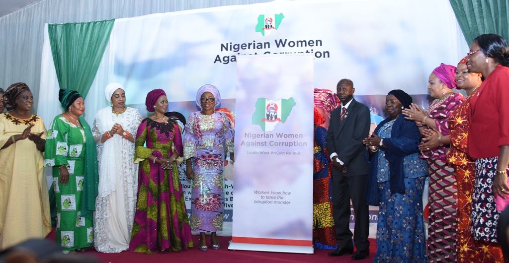 Wife of Lagos State Governor, Mrs. Bolanle Ambode (5th left); her Ogun State counterpart, Mrs. Olufunso Amosun (4th left); Wife of Ooni of Ife, Olori Wuraola Ogunwusi (3rd left); National President, National Council for Women Societies (NCWS), Dr. (Mrs) Gloria Shoda (2nd left); Wife of General Overseer, RCCG Worldwide, Pastor (Mrs) Folu Adeboye; Acting Chairman, Economic & Financial Crimes Commission (EFCC), Mr. Ibrahim Magu (5th right); Deputy Governor of Lagos State, Dr. (Mrs) Oluranti Adebule (4th right); Wife of Oyo State Governor, Mrs. Florence Ajomibi (3rd right); Senior Special Assistant to the President on Sustainable Development Goals, Mrs. Adejoke Orelope-Adefulire (2nd right) and Permanent Secretary, Osun State Ministry of Women, Children & Social Development, Mrs. Omolara Ajayi (right) during the South-West Rollout of Nigerian Women Against Corruption Initiative by the Economic & Financial Crimes Commission (EFCC) in collaboration with the Office of the wife of the President, at the Haven, GRA Ikeja, on Wednesday, February 22, 2017.