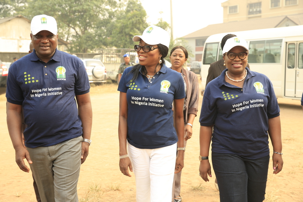 Wife of Lagos State Governor and Founder, Hope for Women in Nigeria Initiative (HOFOWEM), Mrs. Bolanle Ambode (middle), flanked by Executive Chairman, Lagos State Universal Basic Education Board (SUBEB), Dr. Ganiyu Sopeyin (left) and member of HOFOWEM’s Educational Team, Dr. (Mrs.) Yinka Ayandale (right) during the distribution of shoes and socks to pupils of Public Primary Schools in the State, at one of the distribution centres, the Central Primary School, Ikeja, on Monday, 20 February, 2017.