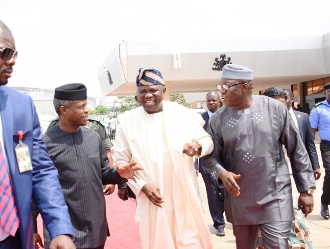  Lagos State Governor, Mr. Akinwunmi Ambode (middle); Acting President, Prof. Yemi Osinbajo (left) and Minister of Solid Minerals, Dr. Kayode Fayemi (right) during the arrival of the Acting President at the Presidential Wing of the Muritala Muhammed International Airport, Ikeja, Lagos, on Tuesday, March 7, 2017