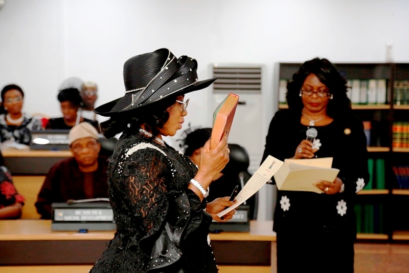 New Chief Judge of Lagos State, Justice Opeyemi Oke (left), taking her Oath of Office, being conducted by Director, Legislative Drafting, Ministry of Justice, Mrs. Yejide Kolawole  (right), before Governor Ambode during the swearing-in ceremony at the EXCO Chamber, Lagos House, Ikeja, on Friday, October 20, 2017.