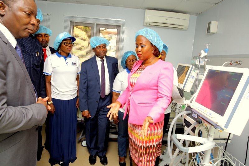 Wife of Lagos State Governor & Chairman, Committee of Wives of Lagos State Officials (COWLSO), Mrs. Bolanle Ambode (middle); Chairman, Lagos State House of Assembly Committee on Health, Hon. Segun Olulade (3rd left); Special Adviser to the Governor on Primary Health Care, Dr. Olufemi Onanuga (2nd left); Medical Director, Island Maternity, Dr. Ademuyiwa Eniayewun (right); Commissioner for Health, Dr. Jide Idris (3rd right), with members of the COWLSO Project Team during the commissioning of Intensive Care Unit facilities & donation of auditory equipment for General Hospitals by COWLSO, at the Lagos Island Maternity Hospital, on Wednesday, 4 October, 2017.