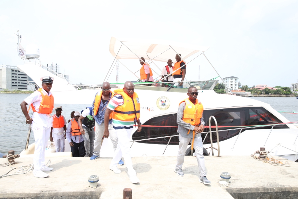 Lagos State Governor, Mr. Akinwunmi Ambode (middle), exiting from one of the new Executive Boats acquired by the State Government shortly after the commissioning at the Caverton Jetty, Victoria Island, Lagos, on Sunday, November 5, 2017.