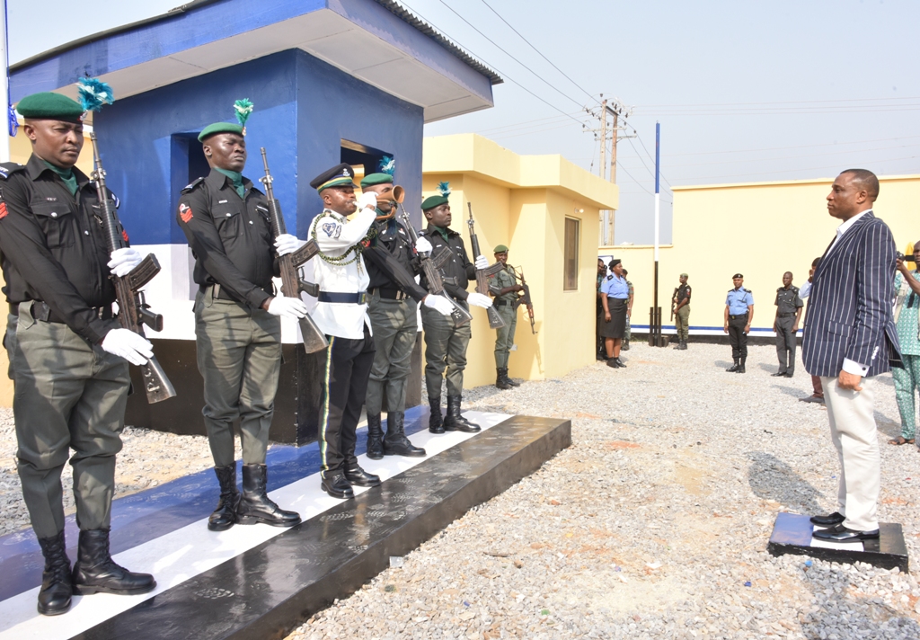 Representative of Lagos State Governor/Secretary to the State Government, Mr. Tunji Bello (right), inspects guard of honour during the commissioning of 63 Squadron Base of the Nigeria Police Mobile Force at Igbogbo, Ikorodu, on Monday, January 22, 2018.
