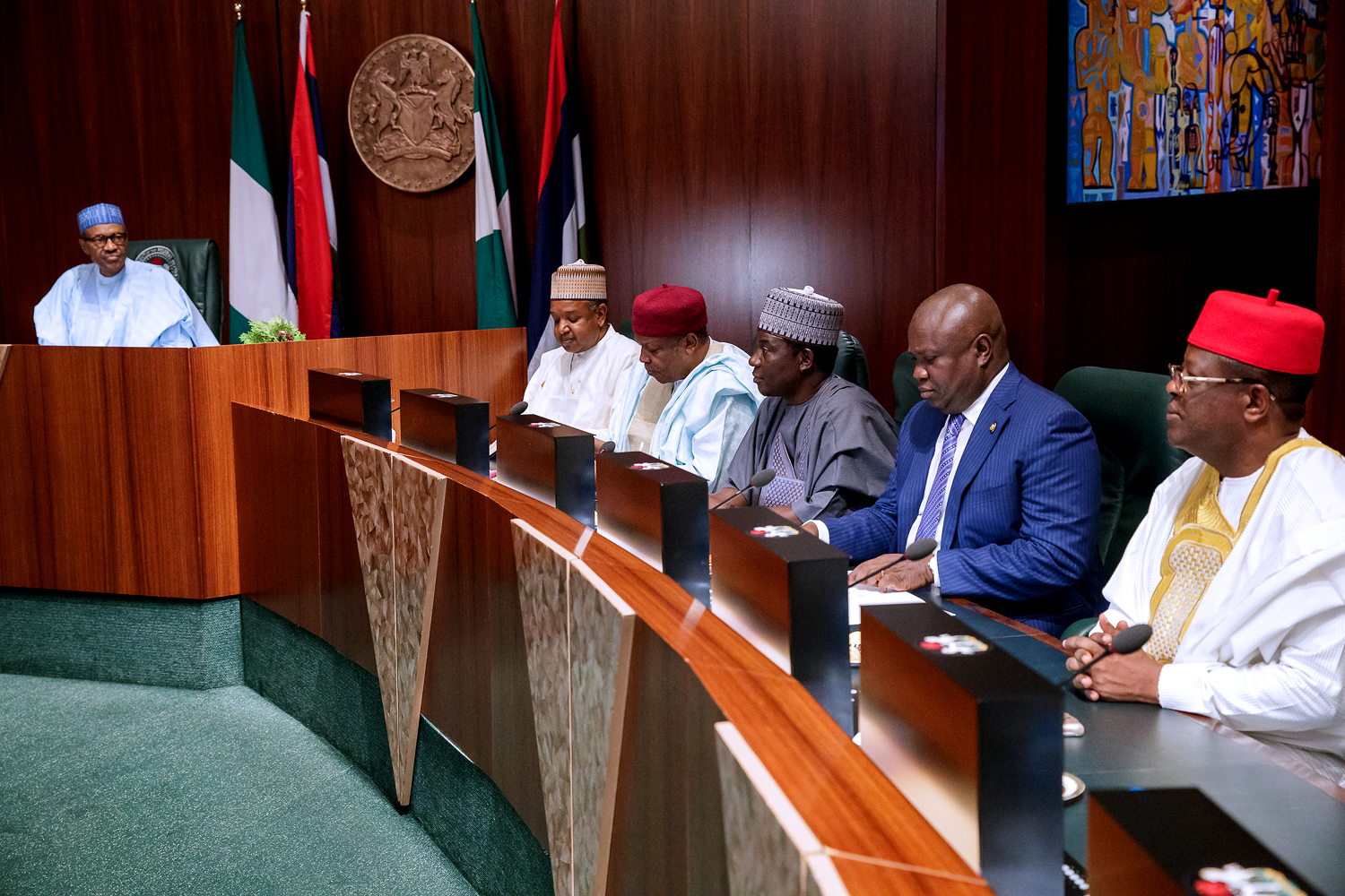 President Muhammadu Buhari (left); Lagos State Governor, Mr. Akinwunmi Ambode (2nd right); Governor David Umahi of Ebonyi State (right); Governor of Plateau State, Barr. Simon Lalong (3rd right); Governor Darius Ishaku of Taraba State (3rd left) and Governor Atiku Bagudu of Kebbi State (2nd left) during the inauguration of National Food Security Council by the President at the Council Chamber, Presidential Villa, Abuja, on Monday, March 26, 2018.