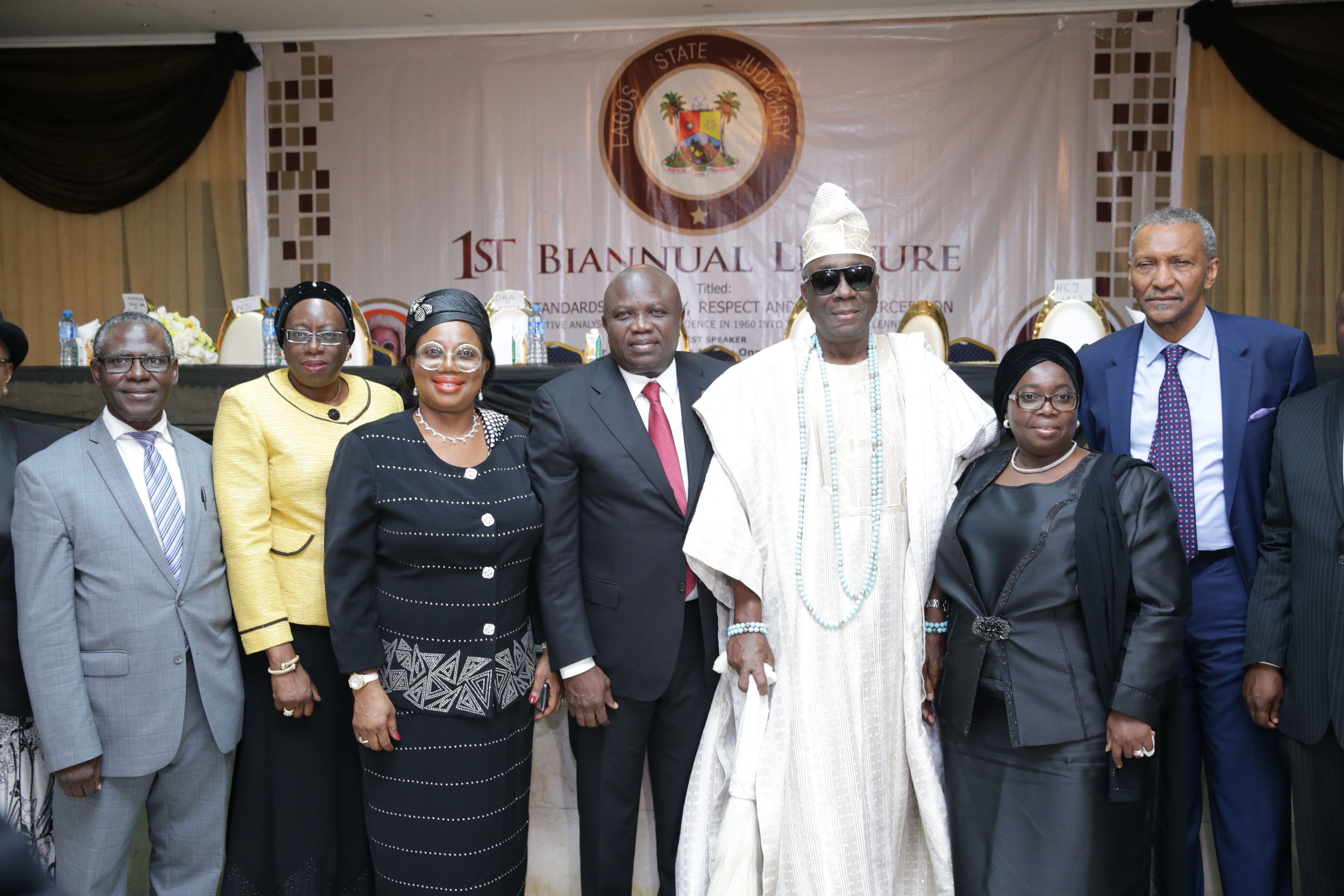 Lagos State Governor, Mr. Akinwunmi Ambode (middle); Lagos State Chief Judge, Justice Opeyemi Oke (3rd left); Justices of the Supreme Court of Nigeria, Justice Kudirat Kekere-Ekun (2nd left); Justice Kumai Bayang Akaahs (left); Oba of Lagos, Oba Rilwan Akiolu I (3rd right); Deputy Governor of Lagos State, Dr. (Mrs) Oluranti Adebule (2nd right) and representative of Chief Justice of Nigeria (CJN), Justice Olabode Rhodes-Vivour (right) during the Lagos State Judiciary first Bi-Annual lecture, at the Lagos City Hall, Lagos Island, on Monday, May 14, 2018.
