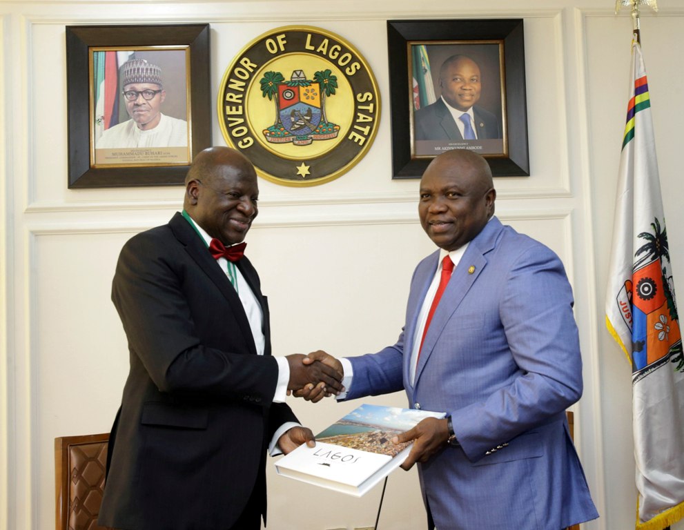 Lagos State Governor, Mr. Akinwunmi Ambode (right), presenting a souvenir to President of Institute of Chartered Accountants of Nigeria (ICAN), Mr. Razak Jaiyeola during a courtesy visit to the Governor by the members of ICAN Governing Council at Lagos House, Alausa, Ikeja, on Tuesday, September 11, 2018. 