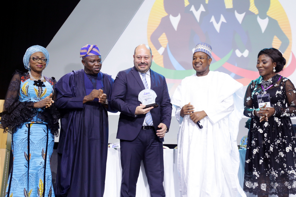 Kebbi State Governor, Alhaji Atiku Bagudu (2nd right); Lagos State Governor, Mr. Akinwunmi Ambode (2nd left); his wife and Chairman, Committee of Wives of Lagos State Officials (COWLSO), Bolanle (left); Chairman, Conference Planning Committee, Dr. (Mrs.) Arinola Oluwo (right) and recipient, Friend of COWLSO Certificate of Appreciation, Mr. Danny Kioupouroglou, Managing Director, Eko Hotels, (middle) during the closing ceremony of COWLSO’s 18th National Women’s Conference, at the Eko Convention Centre, Eko Hotels and Suites, Victoria Island, Lagos, on Thursday, October 25, 2018.