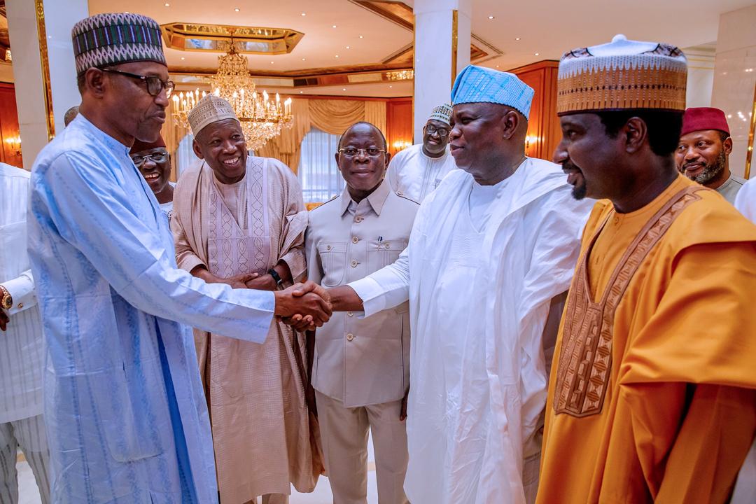 Lagos State Governor, Mr. Akinwunmi Ambode (right), congratulating President Muhammadu Buhari (left) on his re-election while the National Chairman of All Progressives Congress (APC), Comrade Adams Oshiomhole (2nd right); Governor Abdullai Ganduje of Kano State (middle) and Governor Umaru Tanko Al-Mukura of Nasarawa State (2nd left) watch with admiration at the Presidential Villa, Abuja, on Wednesday, February 27, 2019.